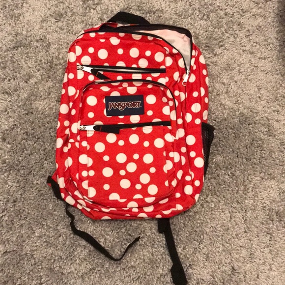 red polka dot backpack
